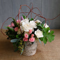 pink spray roses, white roses, scrented geranium, purple tulips by Michler's florist