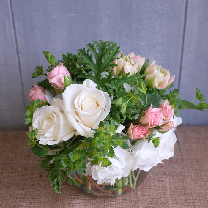 Lush bouquet of pink and white flowers.