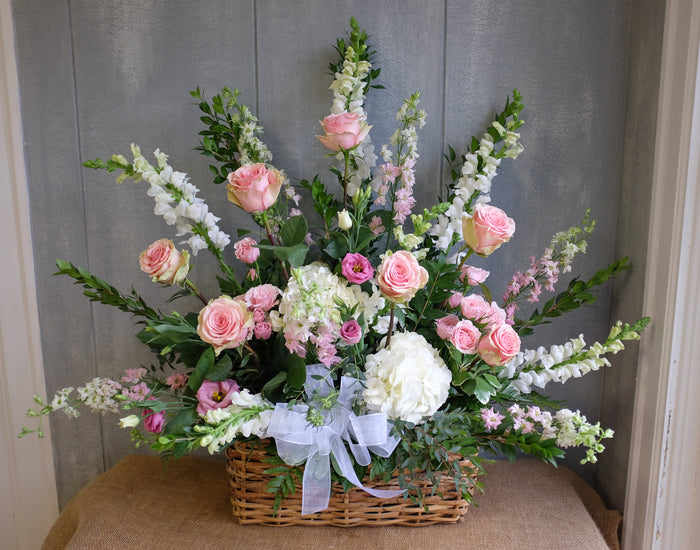 Floral basket spray with white and pink flowers